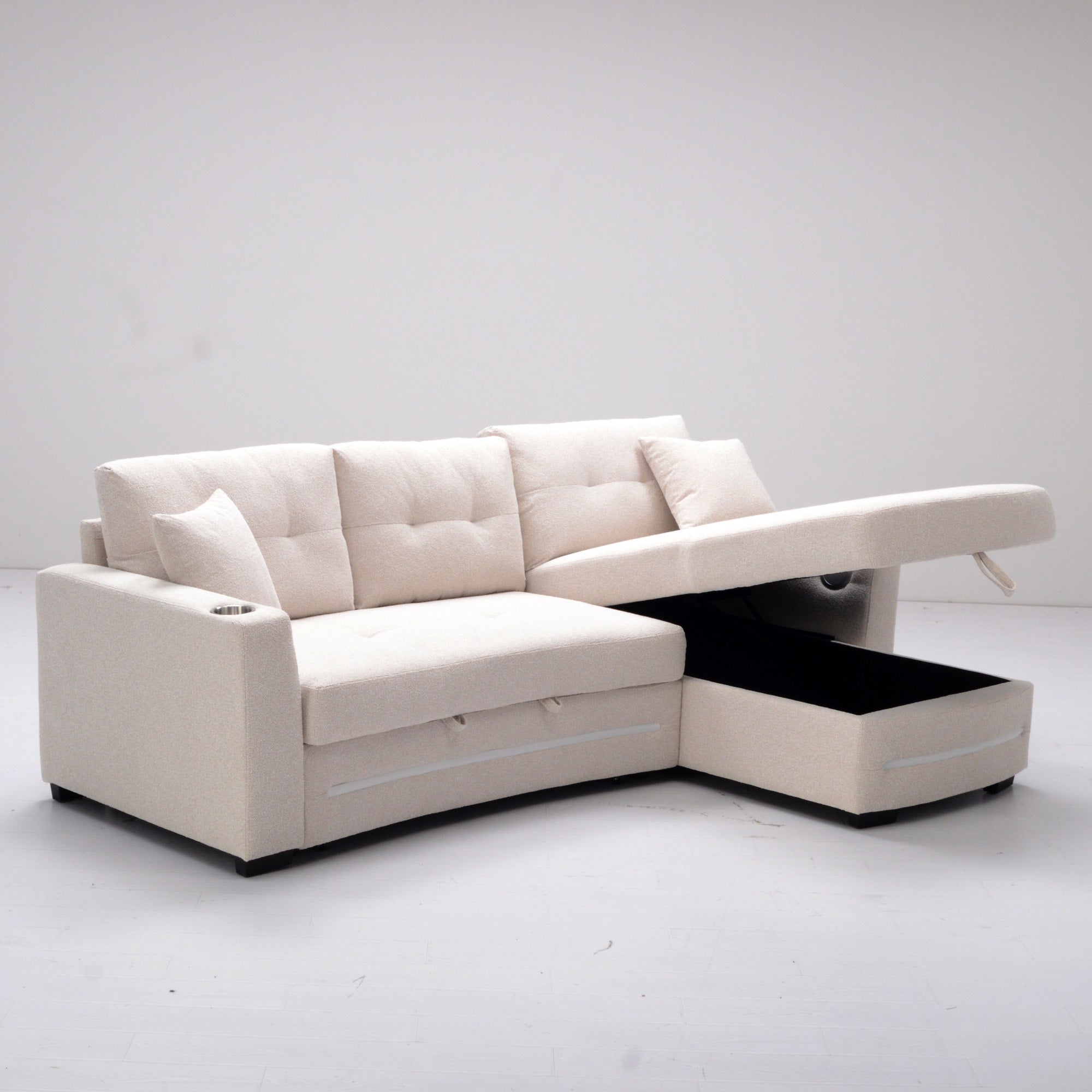 A beige L-Shape Sofa with storage and Pull-out bed.Its directions is RHF.