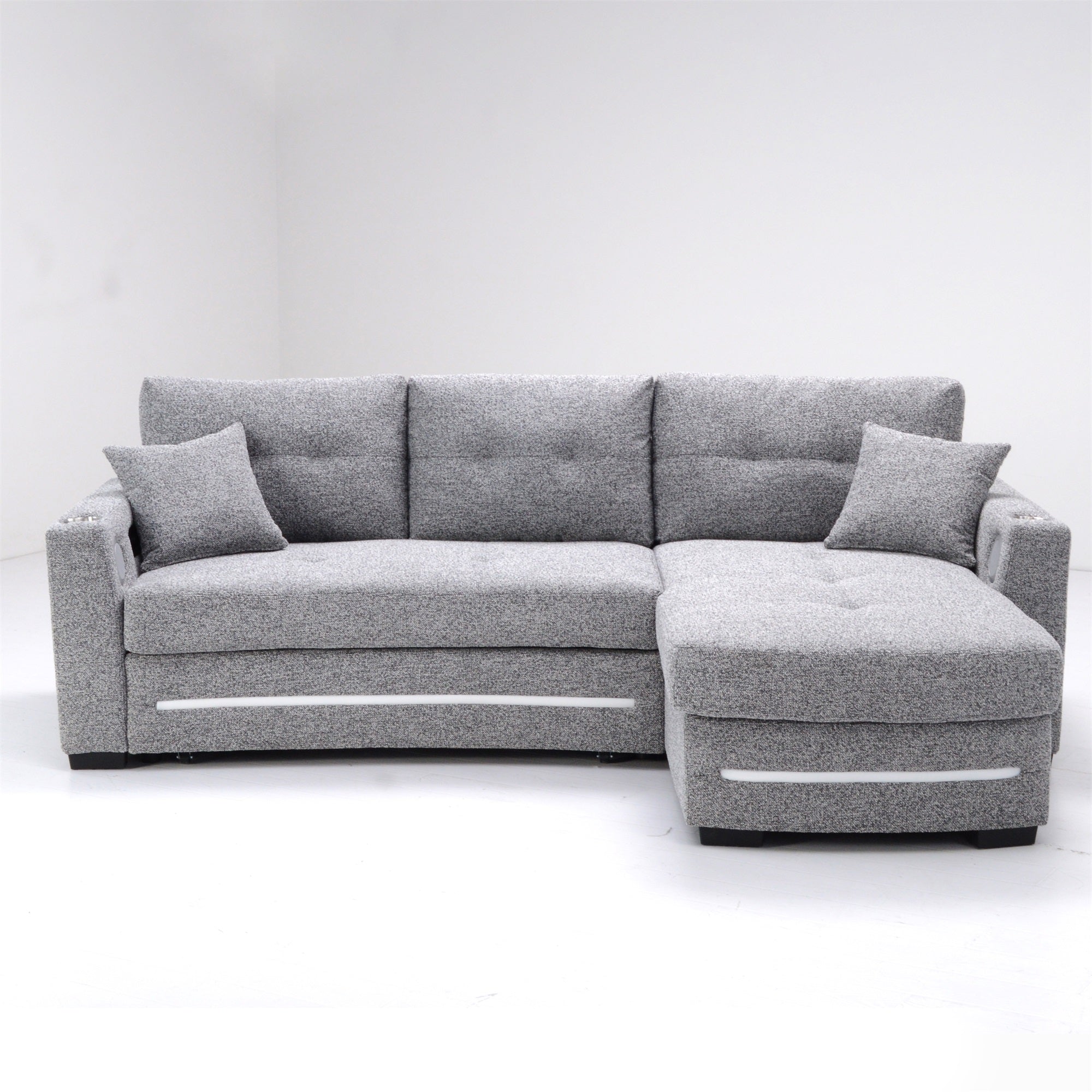 A dark grey L-Shape Sofa with storage and Pull-out bed.Its directions is RHF.