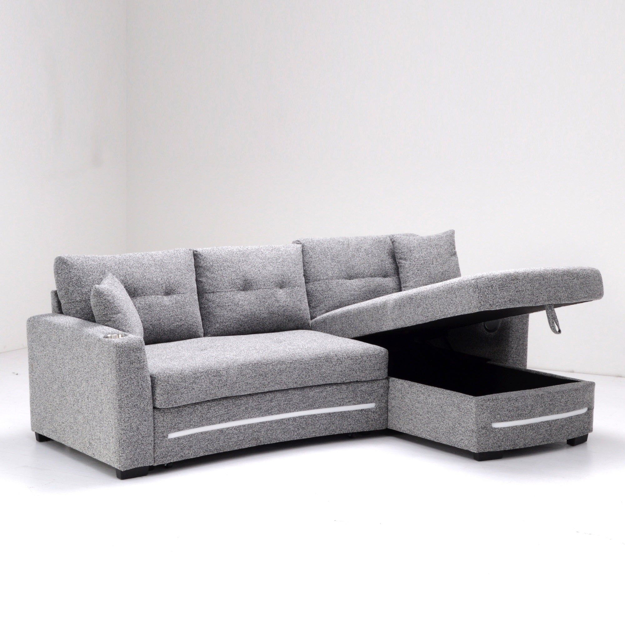 A dark grey L-Shape Sofa with storage and Pull-out bed.Its directions is RHF.