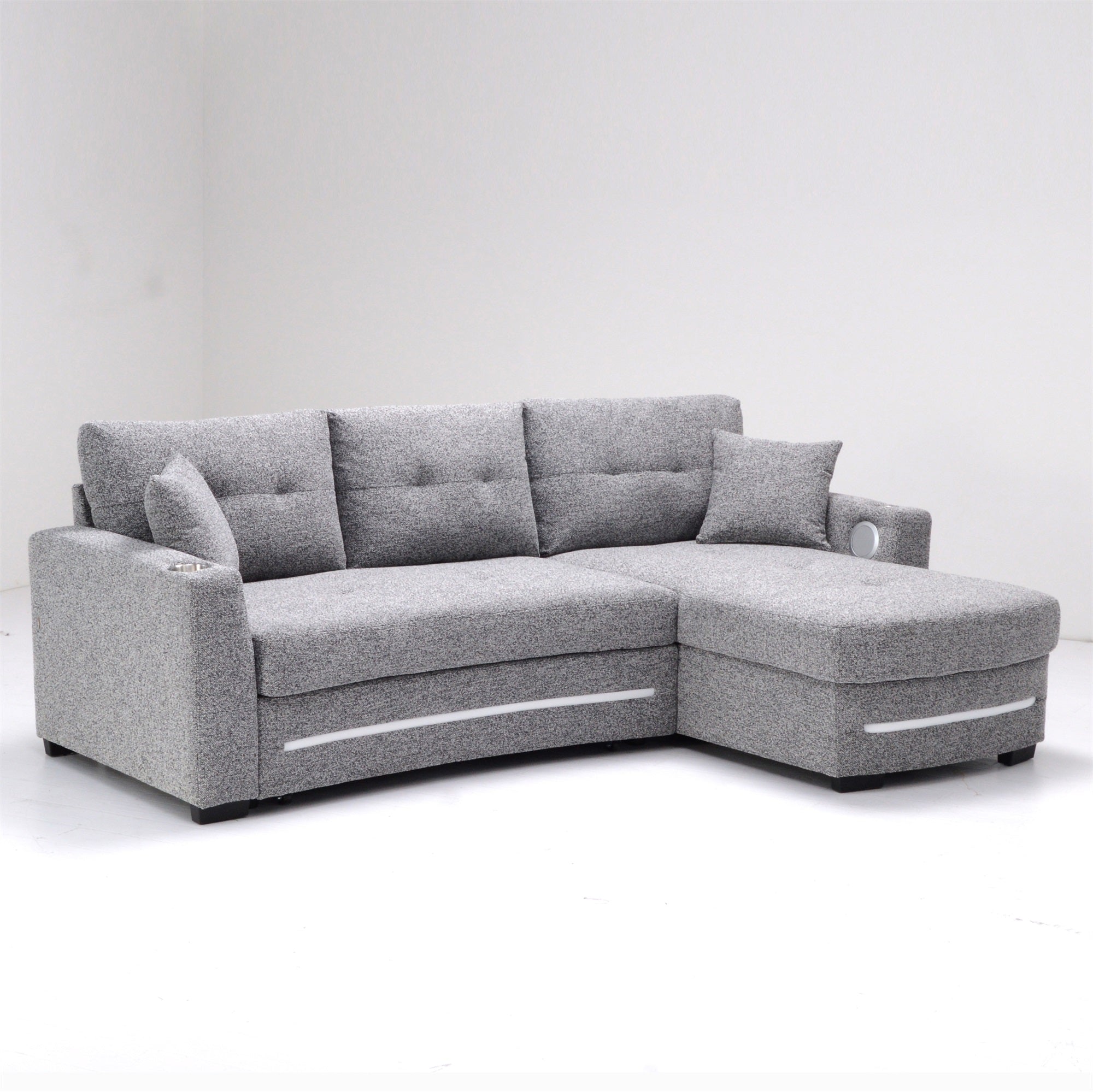 A dark grey L-Shape Sofa with storage and Pull-out bed.Its directions is RHF.