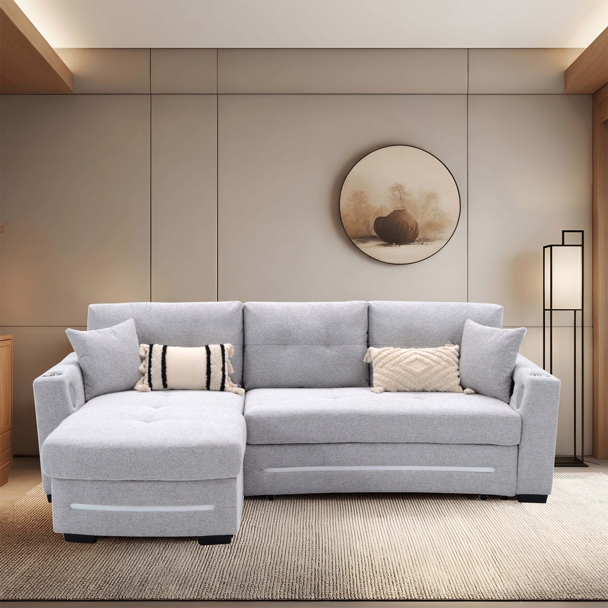 A light grey L-Shape Sofa with storage and Pull-out bed.Its directions is LHF.The overall design is simple and light grey. It is placed in the living room and is both practical and versatile.