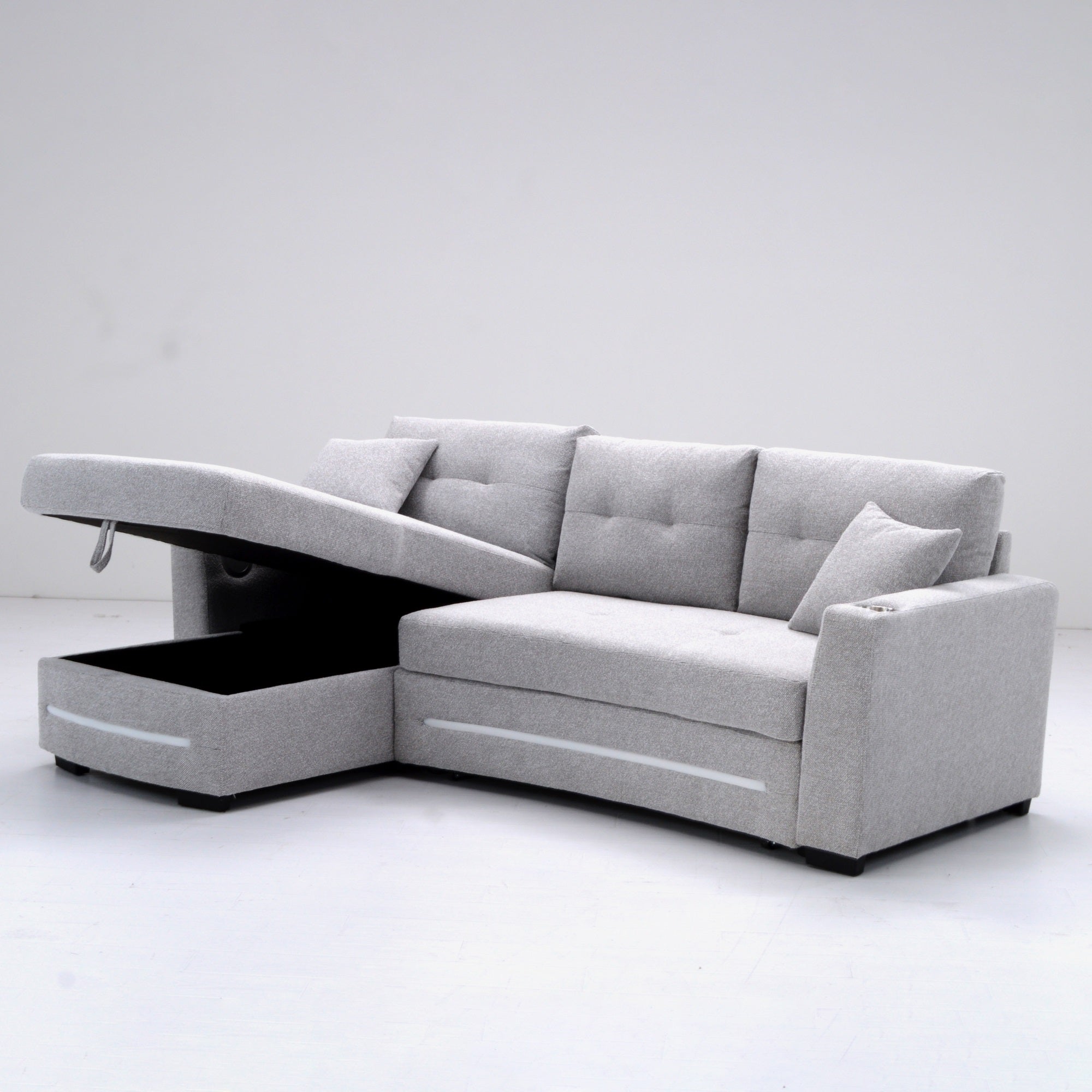 A light grey L-Shape Sofa with storage and Pull-out bed.Its directions is LHF.