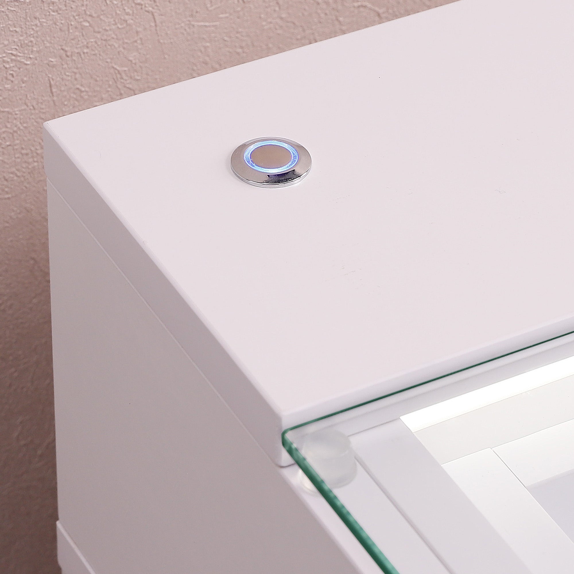 Close-up shot of the switch of the vanity desk lamp.