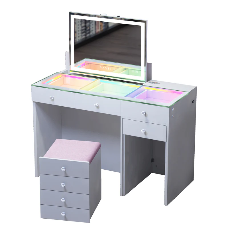 ASCEND Vanity Set featuring an LED makeup mirror, an RGB-illuminated glass countertop, and a matching storage stool, combining makeup display with ample storage space.It is entirely designed in a simple white style.